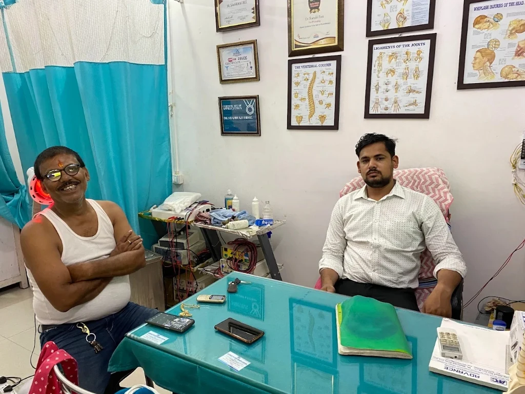 Dr. Shahrukh Firoz in consultation chamber with patient